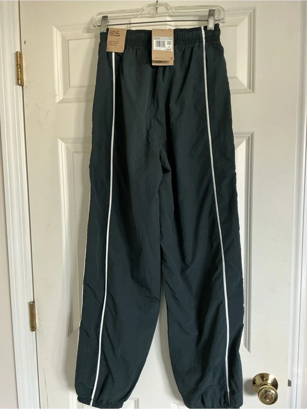 Nike women’s black track pants athletic windbreaker white stripe XS